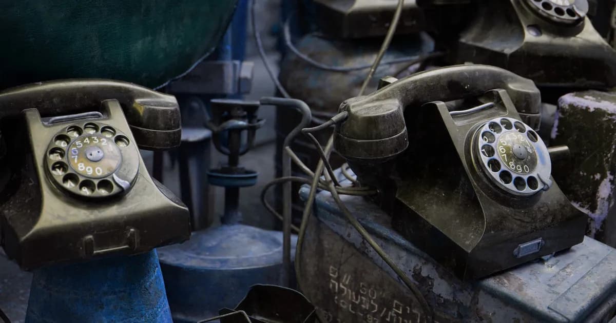 Close-up of vintage rotary telephones with a nostalgic feel, captured indoors