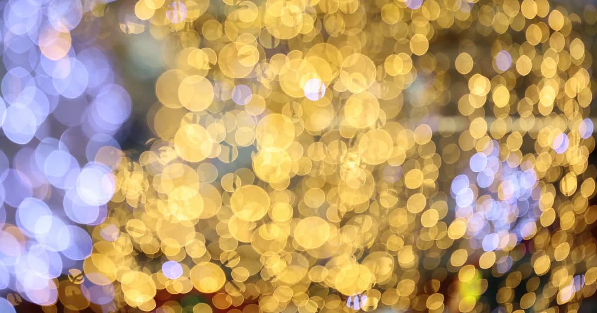 Vibrant bokeh with golden and blue tones in an abstract pattern
