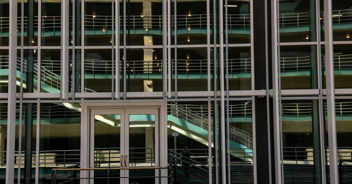 Glass facade reflecting contemporary architecture in Denver, Colorado